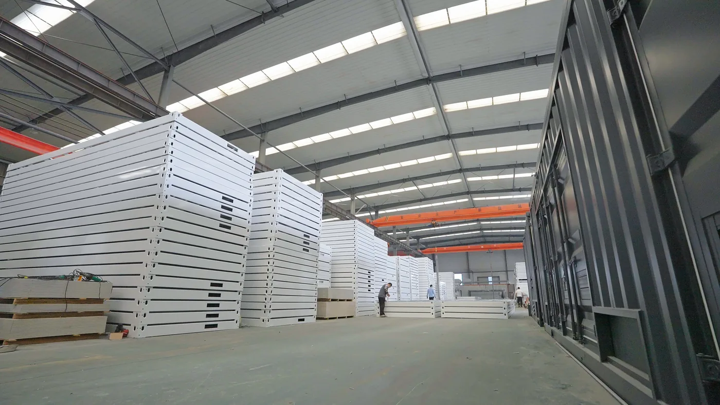 Finished modular building frames organized inside the Huisheng workshop